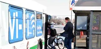 Bennett and Savage board bus