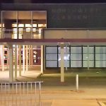 Northwest Classen High School at nite, walkout