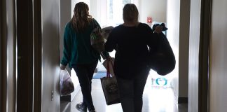 Volunteers Ashley Marshall (L) and Kim Grate head back out to continue the homeless count Thursday