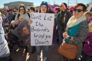 Krystal Lambert holds a sign she made for the Women's March in OKC