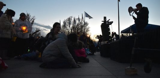 Prayer Vigil teacher walkout on knees