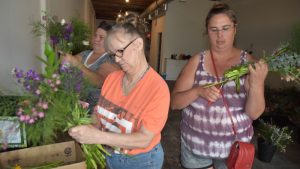 Curbside Mothers Day flower sales 2018 Rene, Rhonda, Jamie