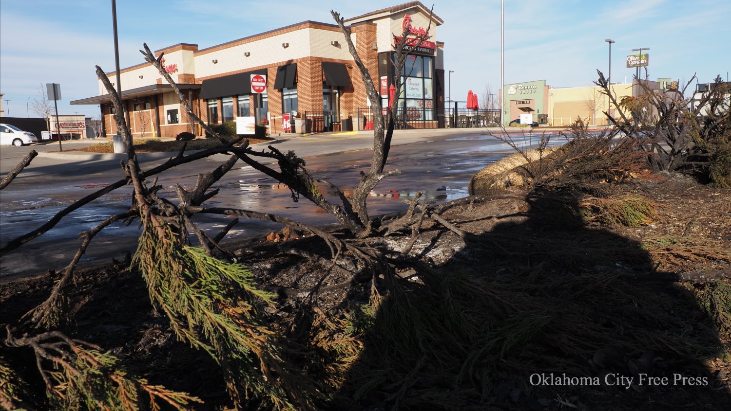 Grass fire damages ten employee vehicles at westside OKC Chick-fil-A