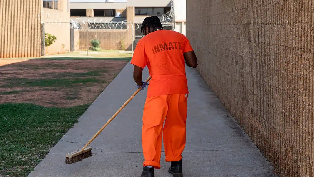 Inmate at an Oklahoma State facility sweeps up - by Brent Fuchs for OW inmate