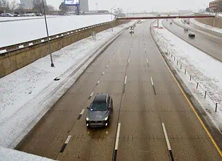 Woman dies while being towed on snow sled; 2 arrested snow