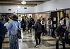 Oklahoma’s eviction process is being used as a form of rent collection, data shows Diverse adults waiting in a hospital corridor, some talking near doors and seating area under bright lights in a medical facility.