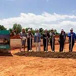PRESS RELEASE: YMCA of Greater OKC breaks ground on Tom and Judy Love North Side YMCA Groundbreaking ceremony for the Tom and Judy Love YMCA with people in hard hats holding shovels beside the sign.