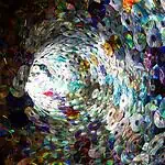PRESS RELEASE: OCU art exhibit makes use of ‘digital debris’ Spiral tunnel made of stacked compact discs reflecting rainbow colors