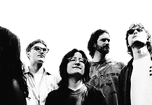Mad Honey build alt-rock landmark on ‘Bridge Over Cumberland’ Five-person rock band standing side by side, looking up, in a black-and-white photo.