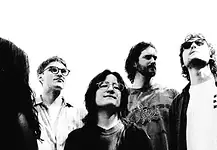 Mad Honey build alt-rock landmark on ‘Bridge Over Cumberland’ Five-person rock band standing side by side, looking up, in a black-and-white photo.