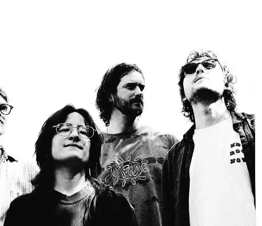 Mad Honey build alt-rock landmark on ‘Bridge Over Cumberland’ Five-person rock band standing side by side, looking up, in a black-and-white photo.