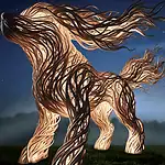 PRESS RELEASE: Name the dog sculpture at the OKC Louisa McCune Animal Welfare Center Abstract wooden horse sculpture made of twisting carved planks, lit against a dark night sky in a foggy field.”