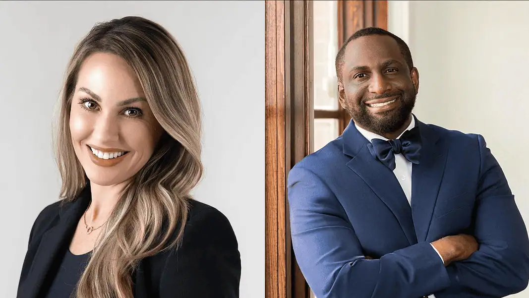 Baker, Lowe Two smiling professionals posing for a corporate headshot: woman in a black blazer on the left and man in a blue suit on the right.