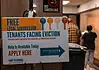 OKC evictions have doubled in a decade Poster offering free legal services for tenants facing eviction in a hallway; no smoking sign above and people in the background.