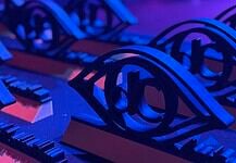 Here are the award winners of the 2026 deadCenter Film Festival! Close-up of ornate black metal eye-shaped sculptures resting on a keyboard, lit in blue and purple stage lighting.