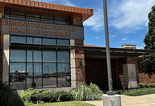 Edmond Schools nix recently renewed contracts; taxpayers cover cost Edmond Public Schools Board of Education building with brick exterior and large windows under a blue sky