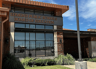 Edmond Schools nix recently renewed contracts; taxpayers cover cost Edmond Public Schools Board of Education building with brick exterior and large windows under a blue sky