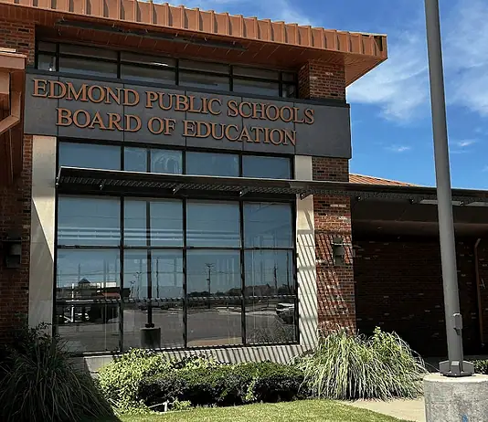 Edmond Schools nix recently renewed contracts; taxpayers cover cost Edmond Public Schools Board of Education building with brick exterior and large windows under a blue sky